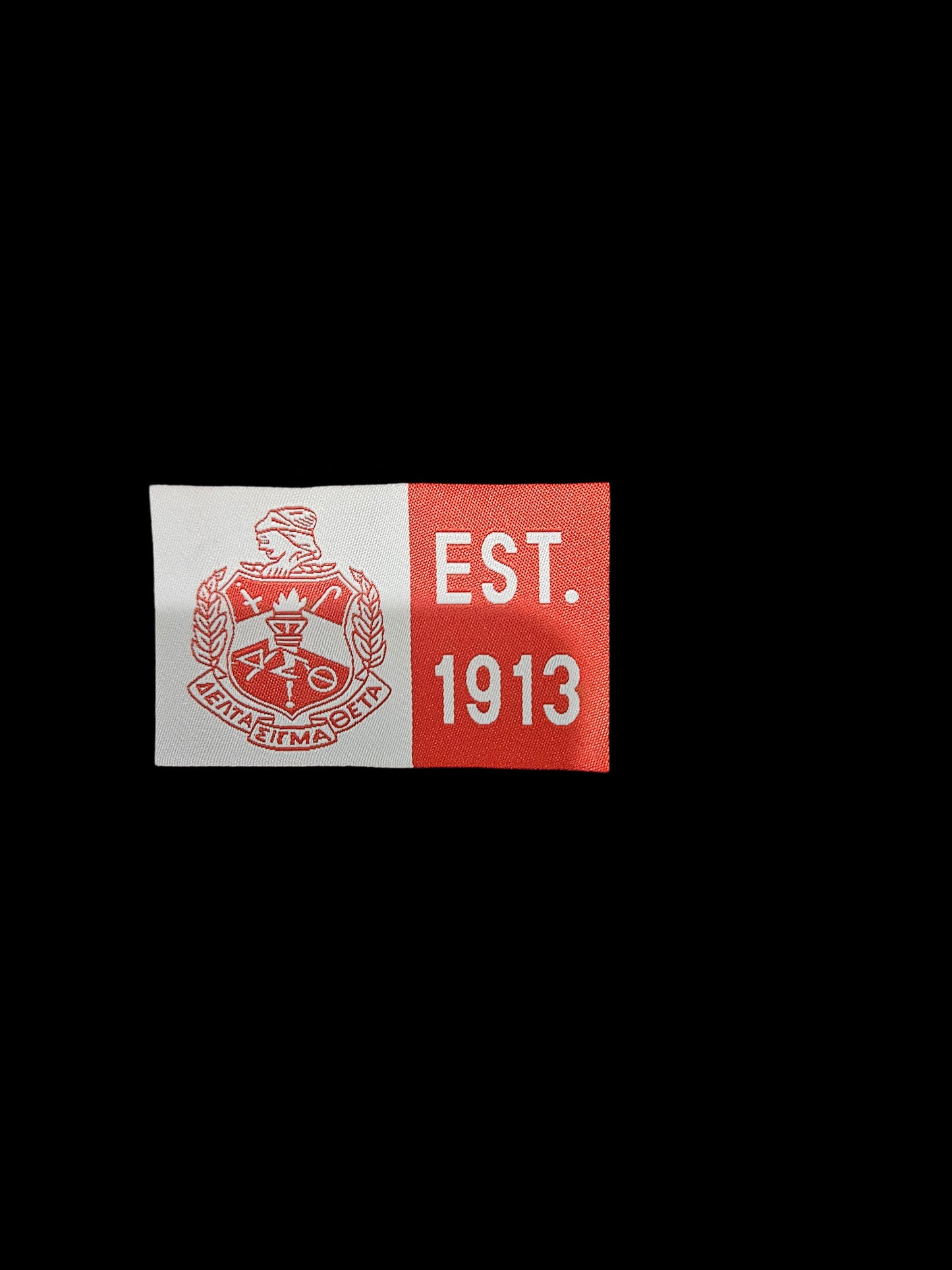 Delta Woven Theta Shield Label